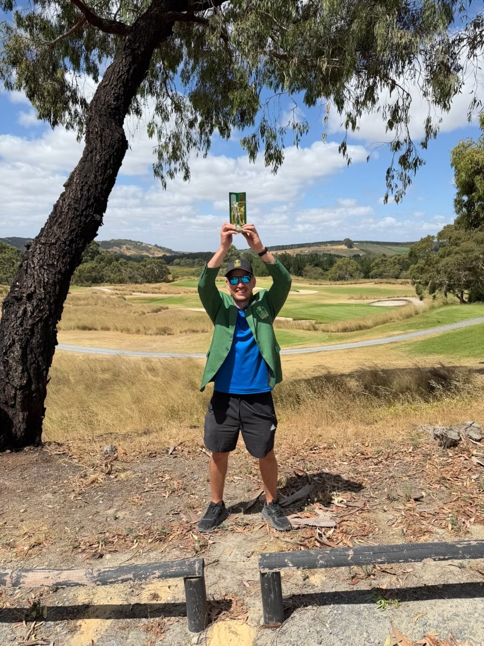 Simon Nedelkovski celebrating his 2026 Pinnacle victory with the trophy raised above his head